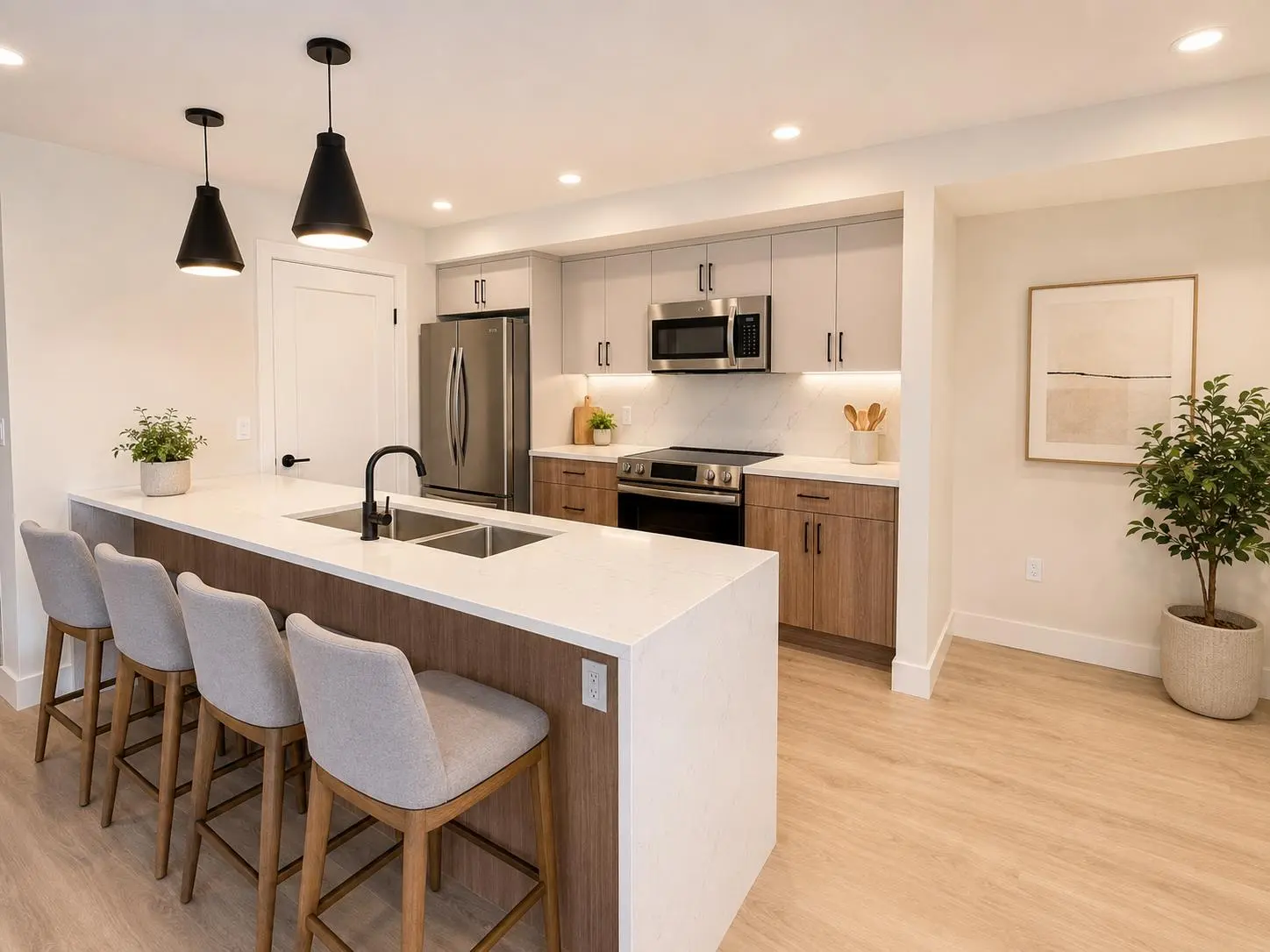 Furnished kitchen with a large island and adjoining living area